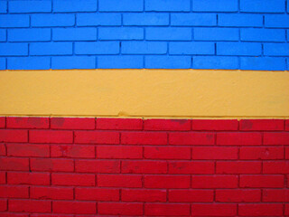 yellow, red and blue brick wall