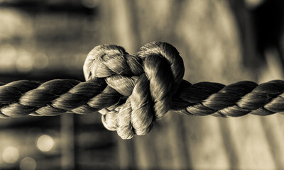 abstract old rope with heart shaped knot , black and white © B. Van