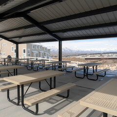 Square crop Pavilion at a park in South Jordan City Utah overlooking snowy Wasatch Mountains