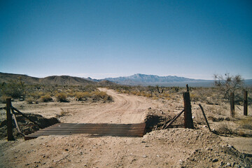 Desert road with bridge over gully 