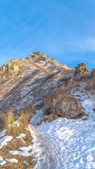 Vertical frame Snowy terrain of a mountain in Provo Canyon on a sunny winter day in Utah