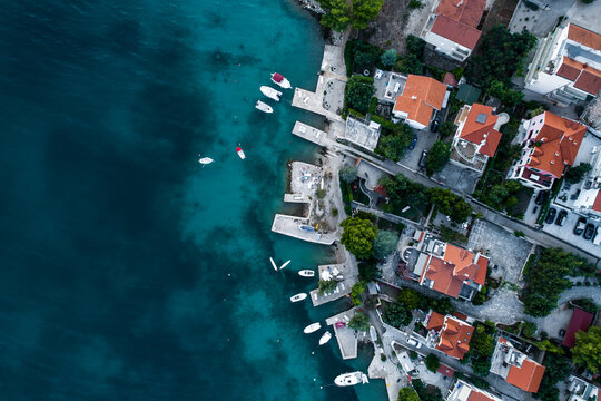 Aerial view of a neighborhood with houses by the sea in Croatia