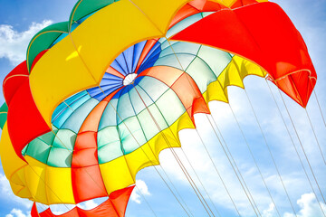 
Freedom Summer holiday background of colorful parachute with bright blue sky and sunlight background
