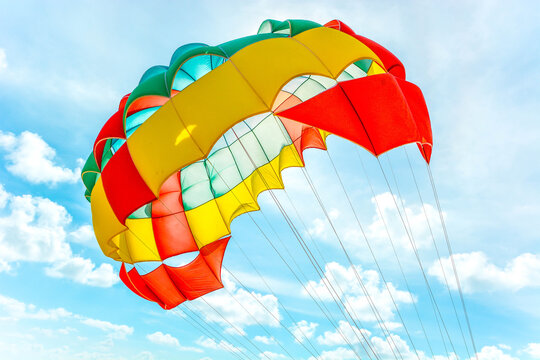 
Freedom Summer holiday background of colorful parachute with bright blue sky and sunlight background
