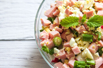 Vegetarian vegetable salad of radish, cucumber. Healthy vegan food.Top view. Flat lay. Copy space for text.