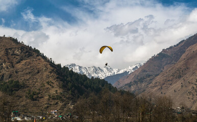 Paragliding in Mountains.