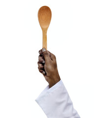A chef arm holding wood spoon with white background