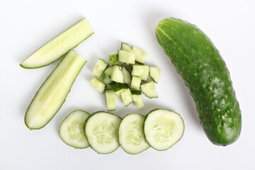Slicied and diced cucumbers. Isolated on a white background. Directly Above.