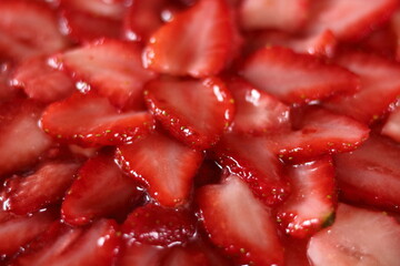 Sliced strawberry topping. Making frozen strawberry cheesecake series.