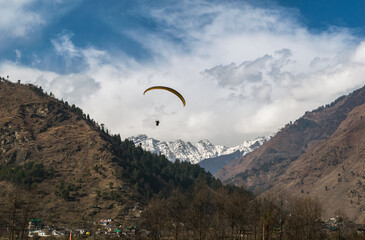 Paragliding in Mountains.