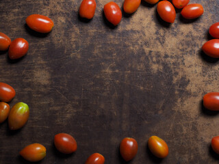 Blank wooden background with cherry tomatoes for cooking recipe