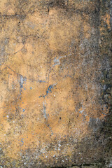 Old cementy moldy wall with peeling and cracks. Abstract background