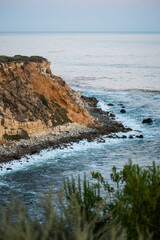 Waves crash on the rocks along the shoreline in Rancho Palos Verdes