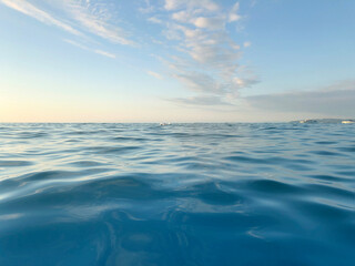 Fototapeta na wymiar Blue Sea wave and cloud sky. Relax Nature water background.