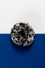 chocolate donut on blue background
