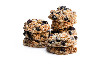 Healthy protein granola crackers with raisins and nuts isolated on white