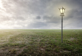Fototapeta na wymiar Simple surrealistic scene with lamp and misty backround