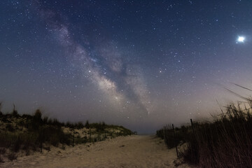 Fototapeta premium The milky Way rising in the sky. Fire Island - Long Island New York