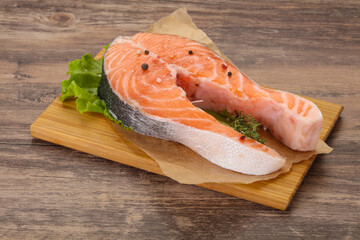 Raw salmon steak - ready for grill