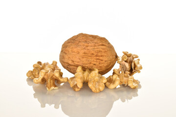 Ripe tasty, organic walnut, close-up, on a white background.