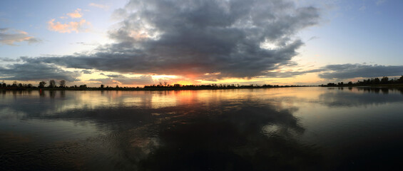 Colorful sunset by the Odra River, Poland.