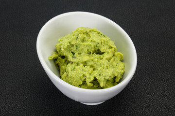 Avocado guacamole sauce with chili pepper