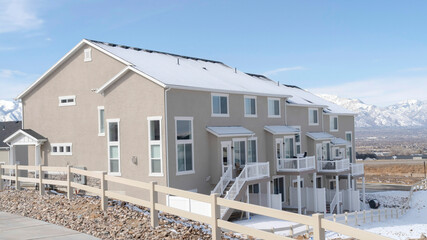 Panorama frame Peaceful neighborhood in South Jordan City with view of distant Wasatch Mountain