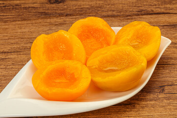 Marinated peaches fruit in the bowl