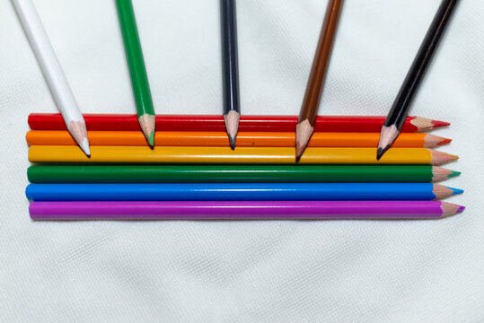 lgbt and human rights minimal concept, a pencils like a LGBT flag, isolated on white background