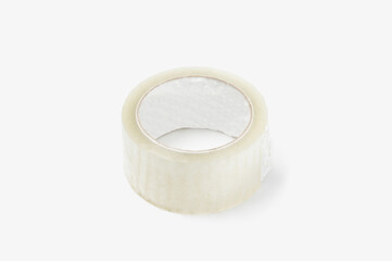 adhesive tape in a roll on a white background. Subject photography.