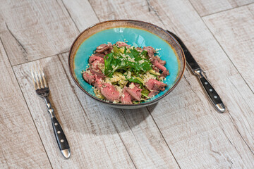 Tasty and healthy salad with roast beef