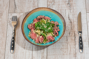 Tasty and healthy salad with roast beef