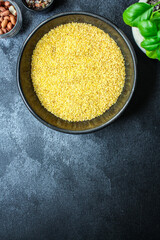 bulgur fine crushed raw grain Menu concept serving size. food background top view copy space for text organic healthy eating keto or paleo diet