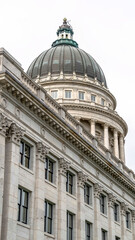 Fototapeta na wymiar Vertical frame Utah State Capital building exterior with classical architecture and dome