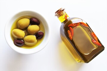 Olives and olive oil . photo isolate on white top view copy space 