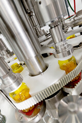 Pharmaceutical conveyor production of vitamins.