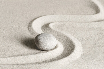 Fototapeta na wymiar Japanese zen garden meditation stone, concentration and relaxation sand for harmony and balance