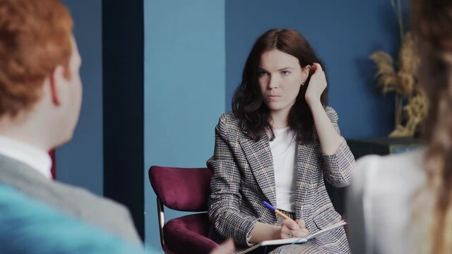 Femaly psychologist at work. Psychologist with the patients.