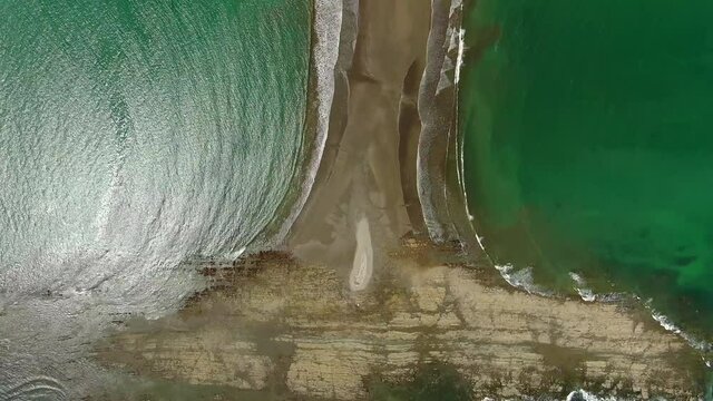 Beautiful cinematic aerial footage of the Whale Tale beach in the Marino Ballena National Park in Costa Rica