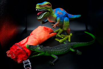 crocodile eat on the hunt with t-rex