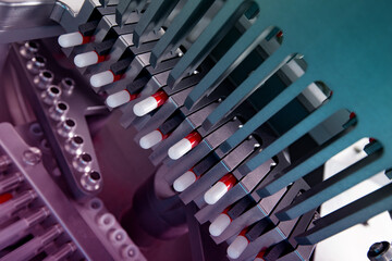 Pills production conveyor line close-up