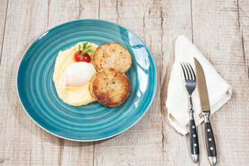 Mashed potatoes, poached egg, tomato, dill, meatballs