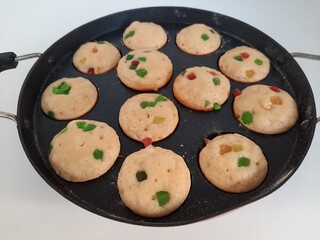 Pan cakes in pan on white background