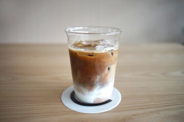 Iced Latte coffee in a grass