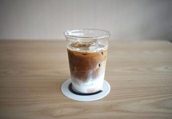 Iced Latte coffee in a grass