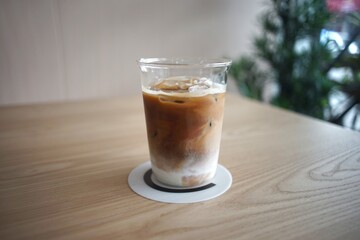 Iced Latte coffee in a grass