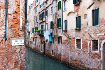 laundry hanging in venice canal