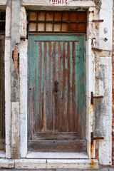 old wooden door in a stone wall