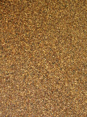 Beige stone gravel background texture. Brown small rocks abstract road pavement pattern