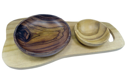 Set wooden bowls on cutting board isolated over white background. 